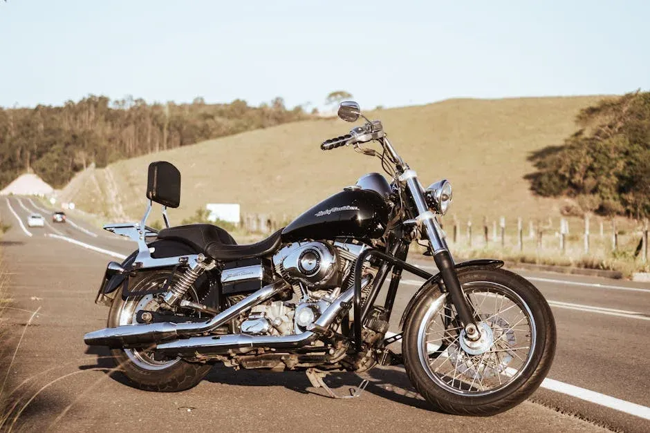 A vintage motorcycle parked on an open road