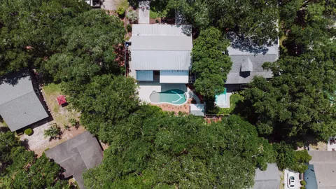 Top-down aerial view of houses and greenery in Hilton Head Island, South Carolina.